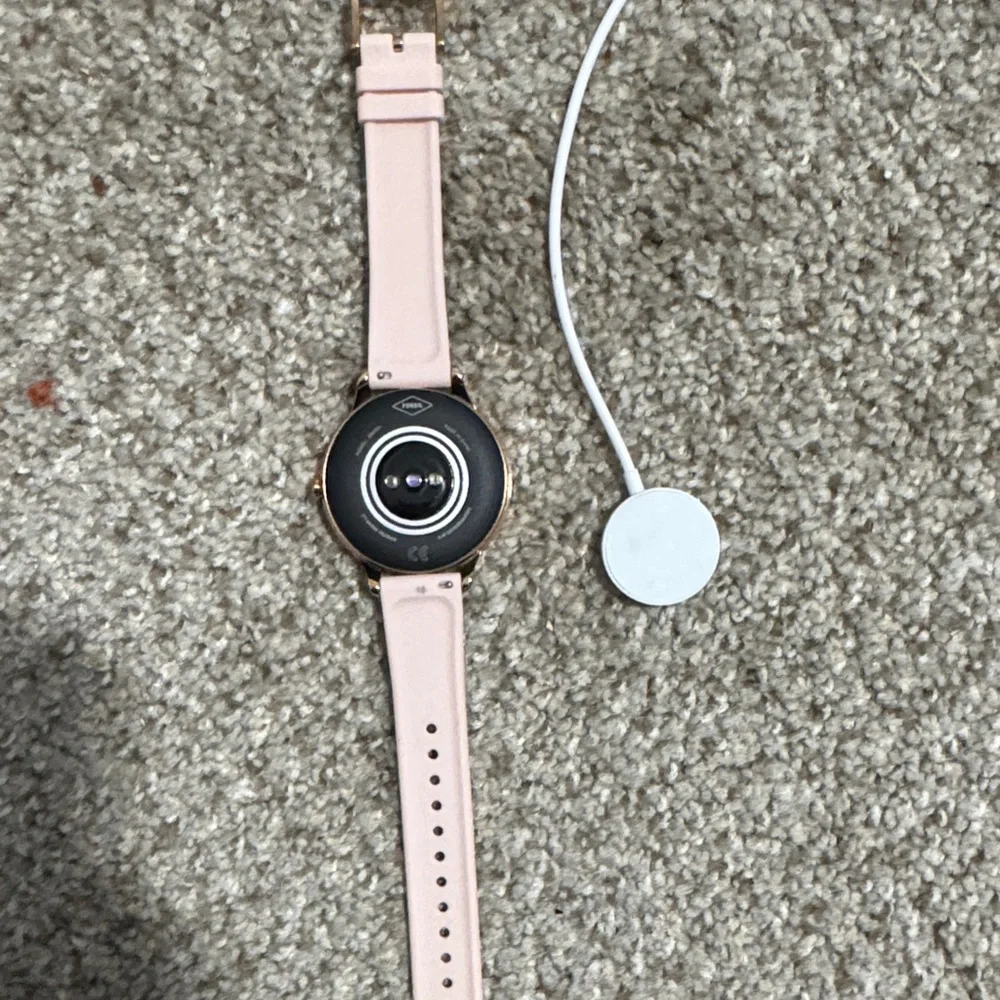 Galaxy Smartwatch with Gold Bezel and Pink Strap